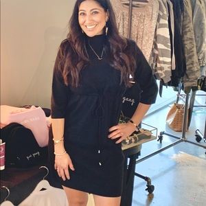 NWT. POL black mock sweater dress with drawstring waist. Size medium and large